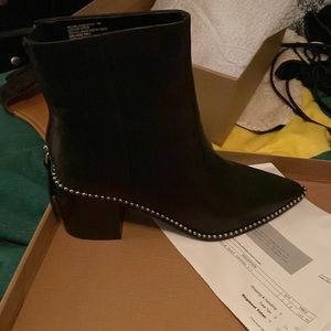 Steve Madden studded black boots.